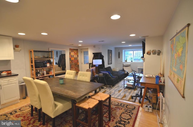 dining space featuring light hardwood / wood-style flooring