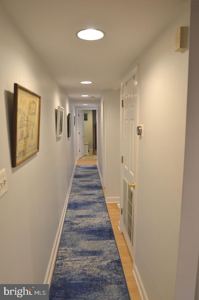 hall featuring hardwood / wood-style floors