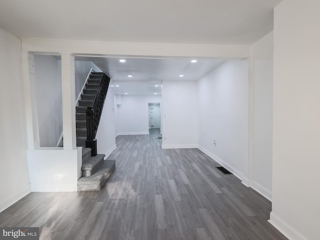 basement featuring dark wood-type flooring