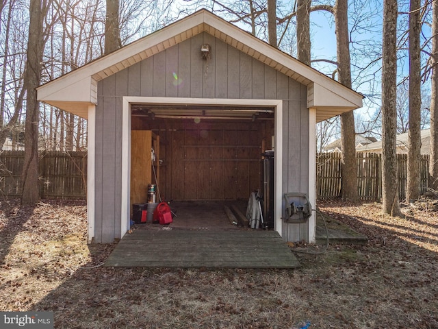 view of shed with fence