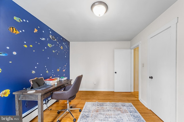 office area with wood-type flooring