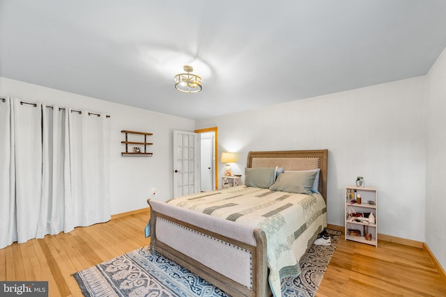 bedroom featuring hardwood / wood-style flooring