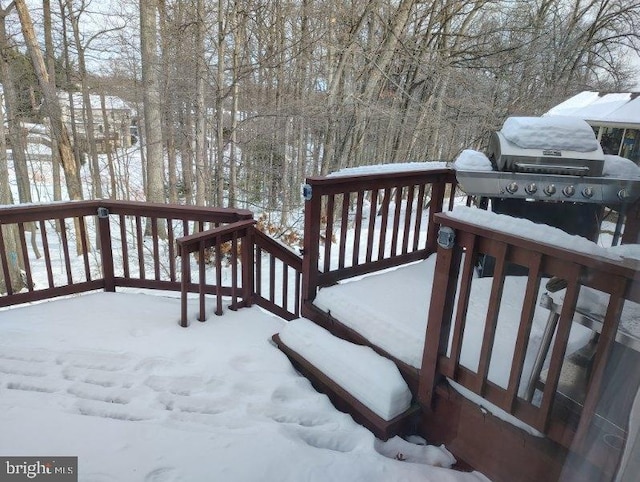 view of snow covered deck