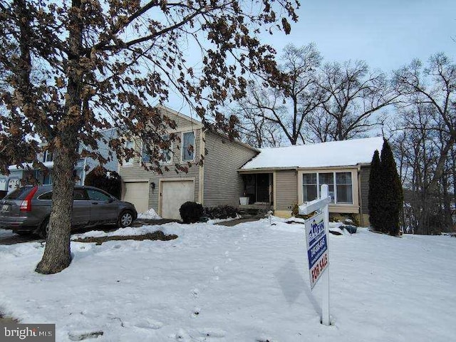 tri-level home with an attached garage