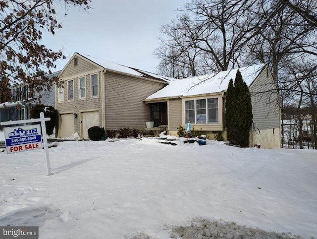 tri-level home featuring a garage