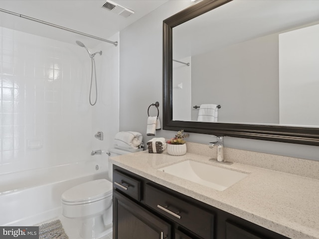 full bathroom with shower / bathing tub combination, vanity, and toilet