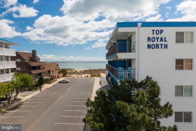 view of building exterior with a water view