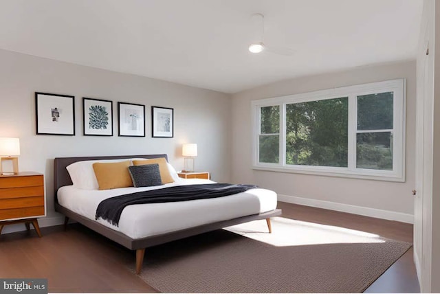 bedroom with wood-type flooring