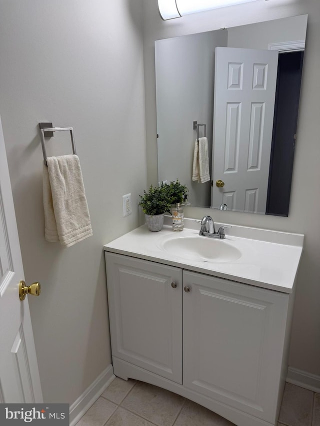 bathroom featuring tile patterned floors and vanity