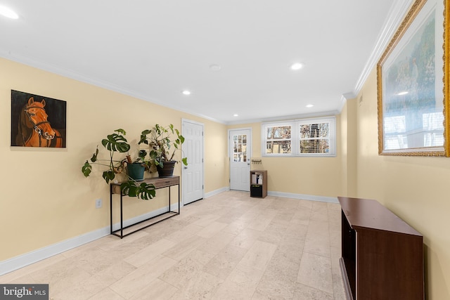 hallway featuring ornamental molding