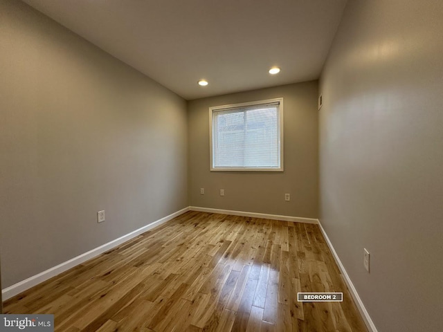 unfurnished room featuring light wood-type flooring