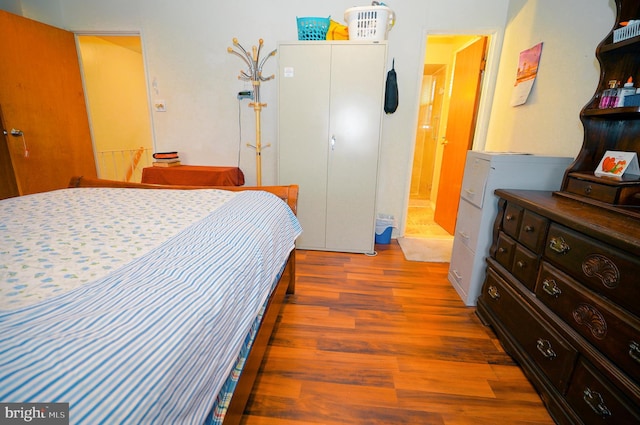 bedroom with light hardwood / wood-style floors