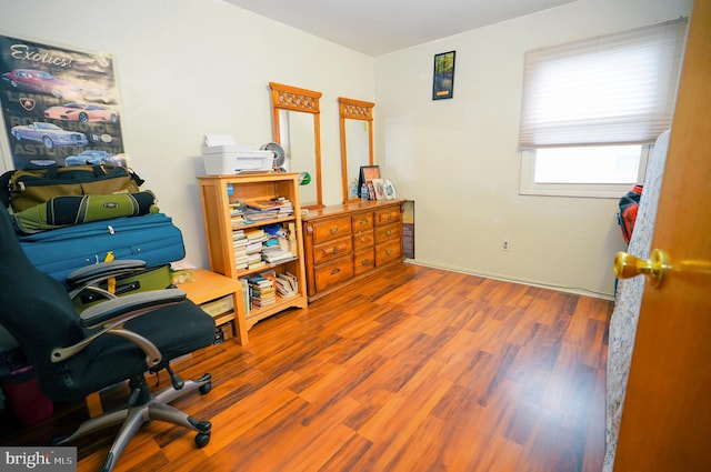 office space with hardwood / wood-style flooring