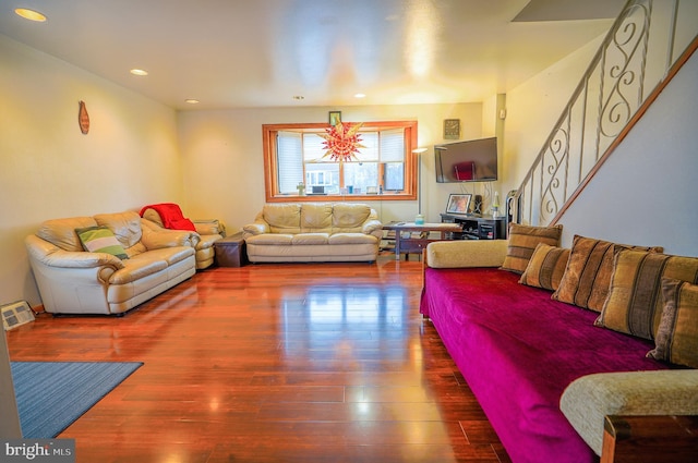 living room with dark hardwood / wood-style floors