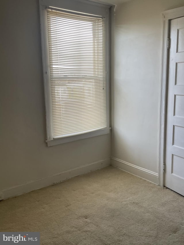 view of carpeted spare room