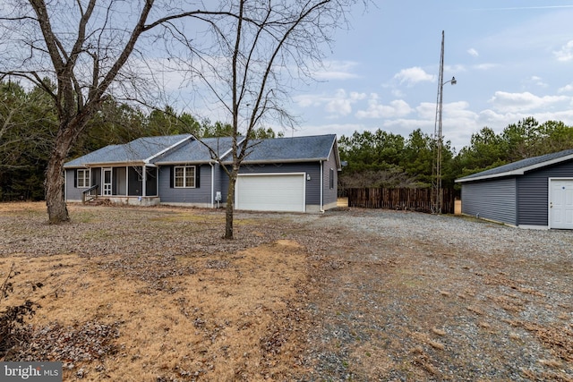 single story home featuring a garage