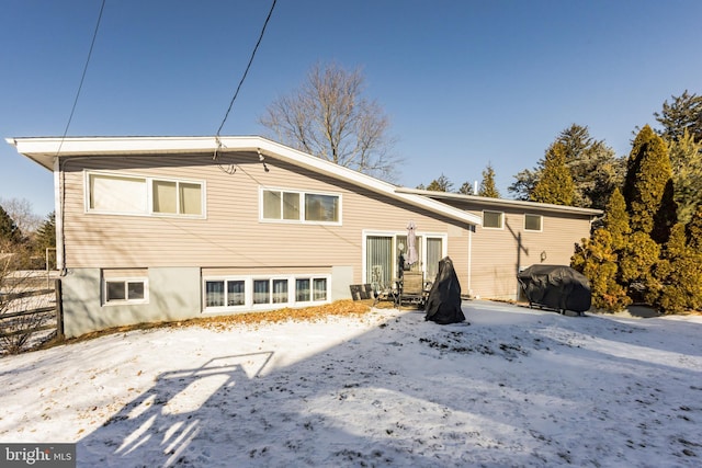 view of snow covered property