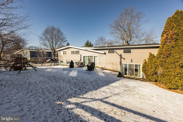 view of snow covered property