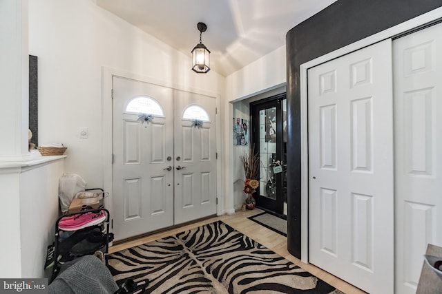 foyer with light hardwood / wood-style floors