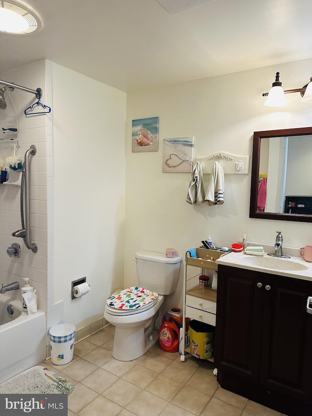 full bathroom featuring tile patterned flooring, vanity, tub / shower combination, and toilet