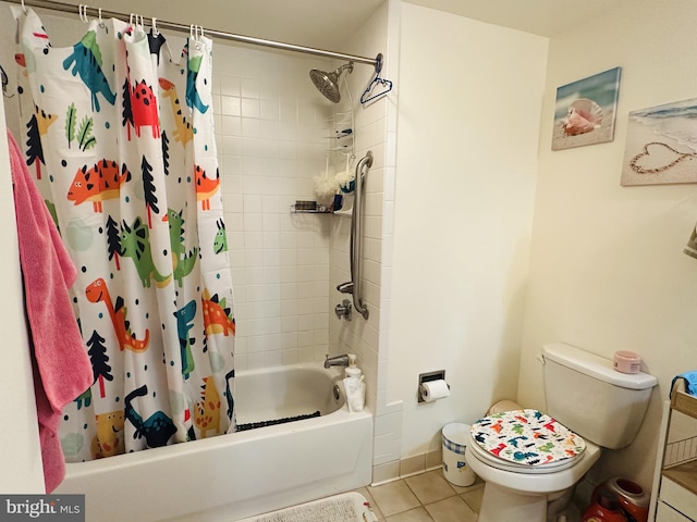 bathroom featuring tile patterned floors, toilet, and shower / bath combo with shower curtain