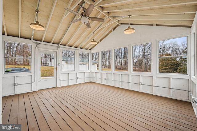 unfurnished sunroom with vaulted ceiling with beams, wood ceiling, and ceiling fan