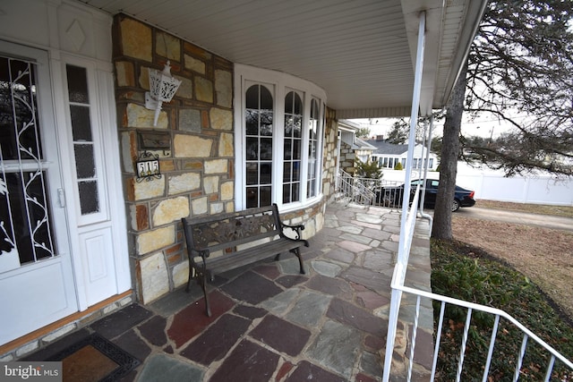 view of patio featuring a porch