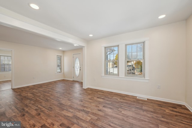 interior space with dark wood-type flooring