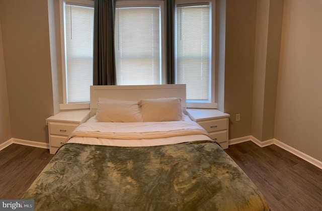bedroom featuring dark hardwood / wood-style floors
