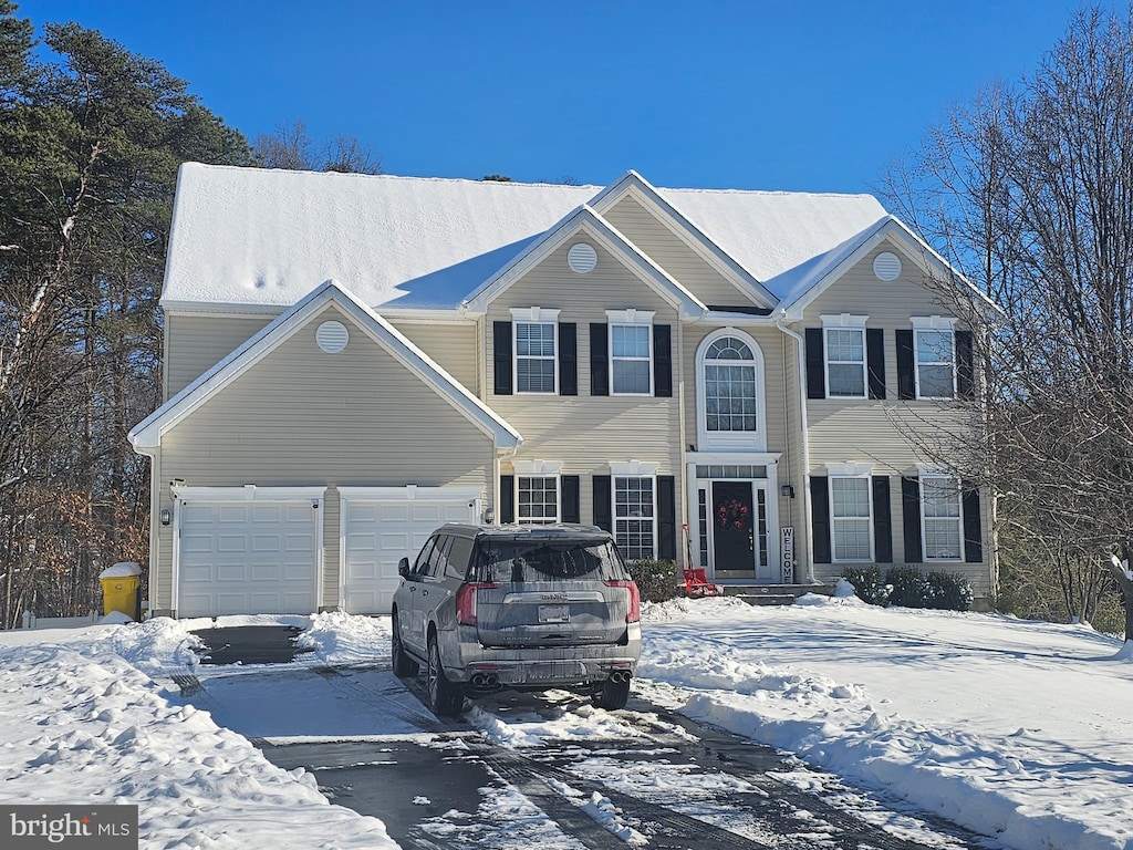 view of front of home with a garage