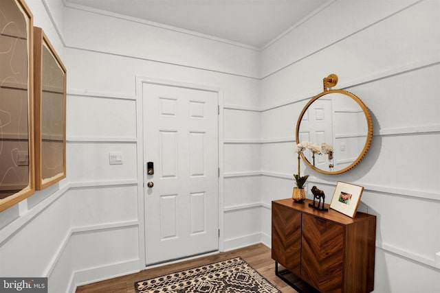 foyer entrance featuring wood-type flooring