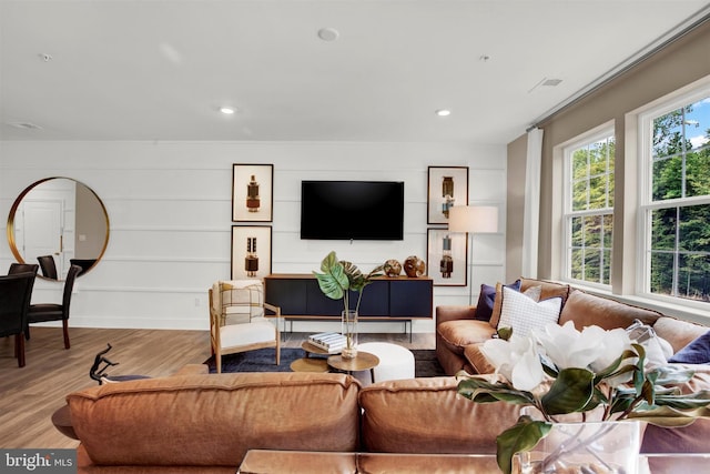 living room with light hardwood / wood-style floors