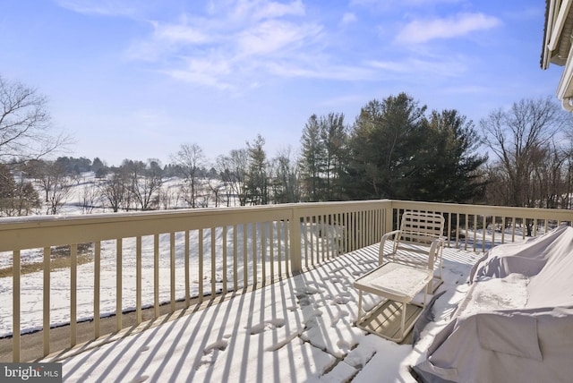 view of snow covered deck