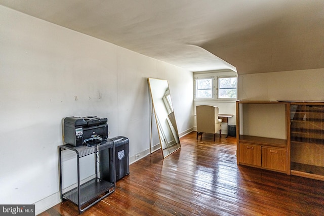 bonus room featuring dark hardwood / wood-style floors