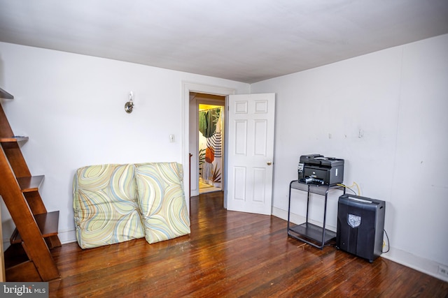 misc room with dark wood-type flooring