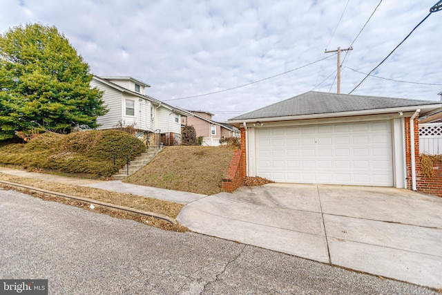 view of property exterior featuring a garage