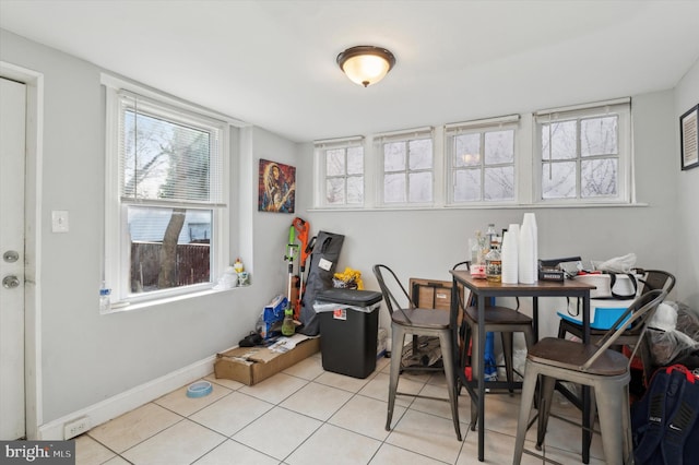 dining room featuring light tile patterned flooring