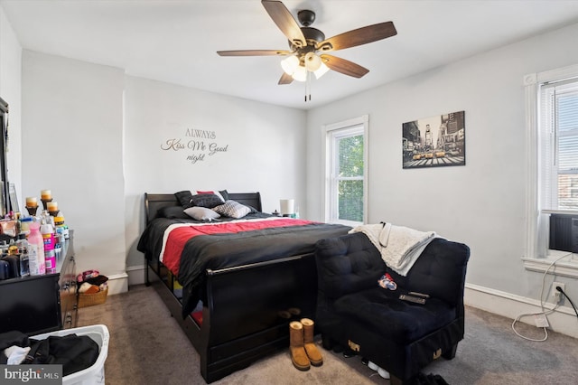 carpeted bedroom featuring ceiling fan