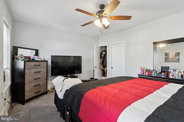 bedroom featuring light colored carpet and ceiling fan