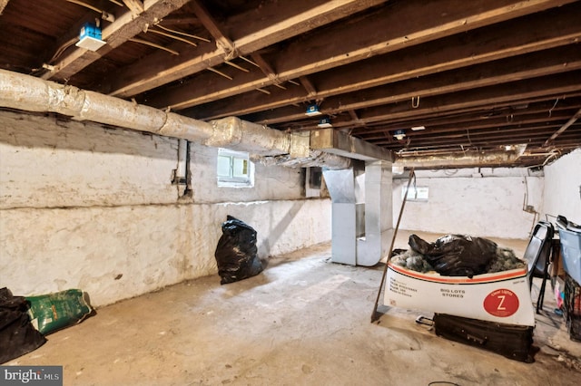 basement featuring heating unit