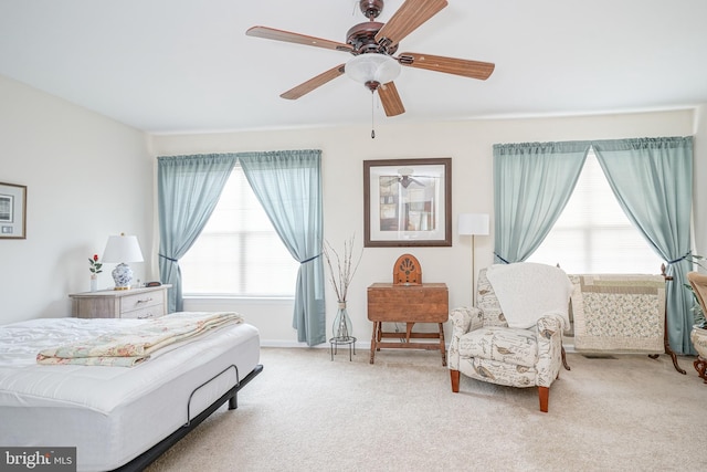 bedroom with ceiling fan and carpet