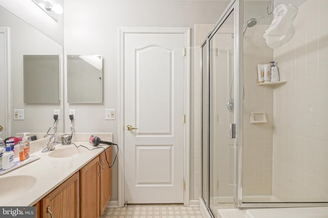 bathroom featuring vanity and walk in shower