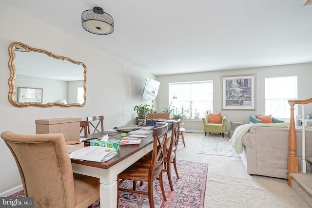 view of carpeted dining area