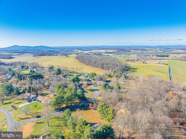 bird's eye view featuring a mountain view and a rural view