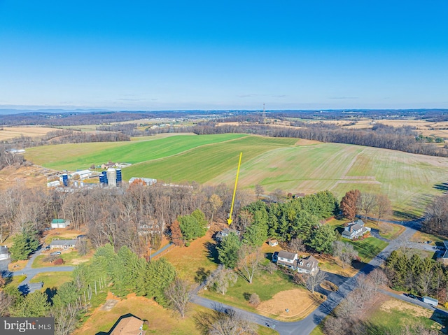 birds eye view of property featuring a rural view