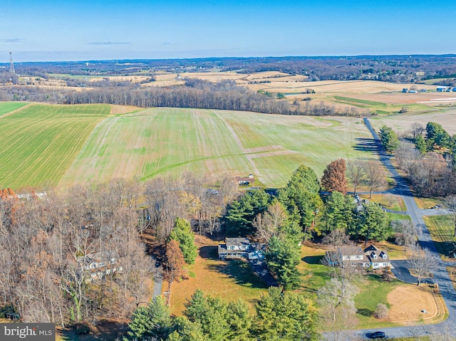 birds eye view of property featuring a rural view