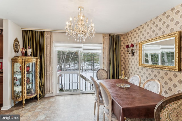 dining room featuring a chandelier