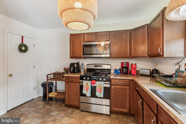 kitchen featuring stainless steel appliances and sink