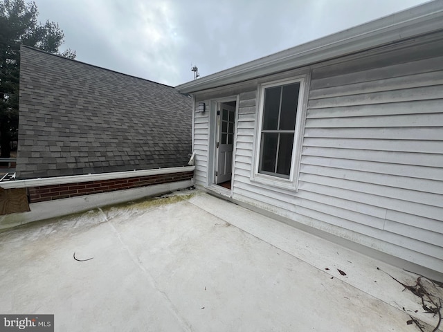 doorway to property featuring a patio