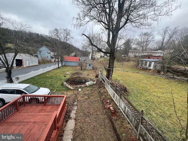 view of yard with a wooden deck